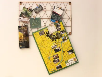 a map hanging on a wall with other items at Casa del Agua in Anna