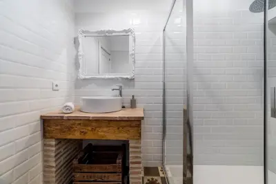 a bathroom with a sink and a mirror at My Loft 4 You Ruzafa Style III in Valencia