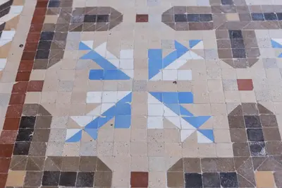 a tiled floor with blue and white tiles at Casa Nolla in Valencia