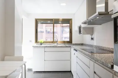 a bathroom with a sink and a shower at ApartUP Mestalla Home in Valencia
