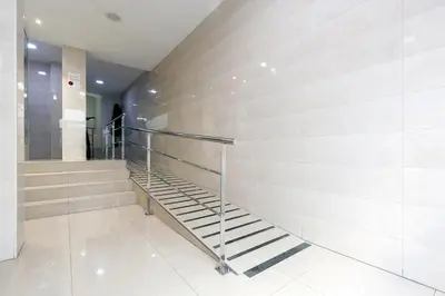 a metal staircase in a building with a wall at Carmen Apartment in Valencia