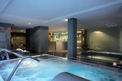 a jacuzzi tub in a hotel room at Primus Valencia in Valencia
