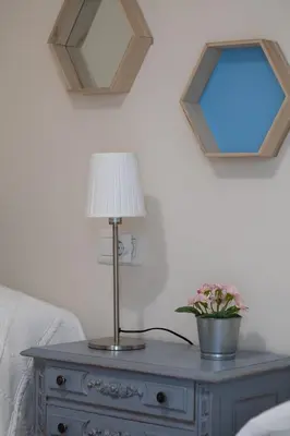 a bedroom with a bed with two pillows on it at La Seda Stay in Valencia