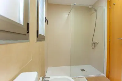 a bathroom with a shower and a sink at 4-Seasons Penthouse Cullera in Cullera