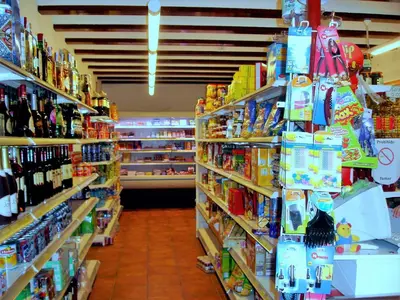 a store aisle filled with lots of different types of food at Apartamentos Concha del Mar in Sagunto