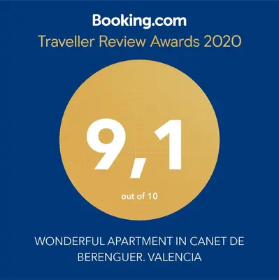 a poster with a yellow circle with the number nine at WONDERFUL APARTMENT IN CANET DE BERENGUER. VALENCIA in Valencia