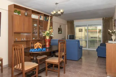 a kitchen and dining room with a table and chairs at Mar y Montaña, 2º-18 in Cullera
