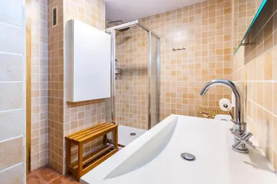 a bathroom with a sink and a shower at Fun&Happy VLC Center in Valencia