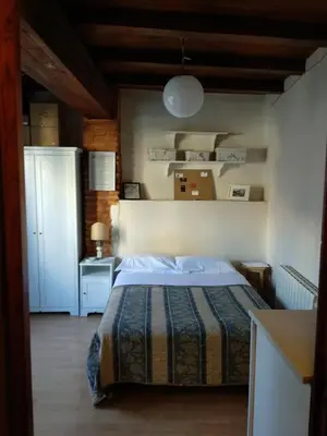 a bedroom with a bed in a room at Centro con encanto. in Valencia