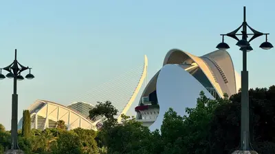 a view of a building with two street lights at Cosy Rooms Bolsería in Valencia