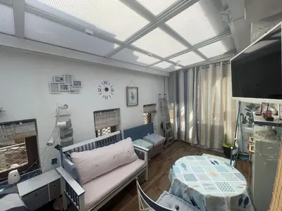 a hospital room with a bed and a tv at Varone in Requena
