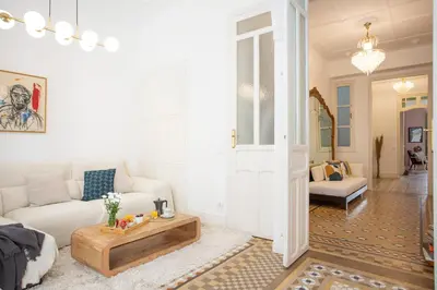 a living room with a couch and a table at SingularStays Ms Rogers in Valencia