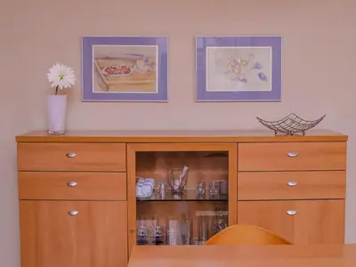 a television on a white shelf in a room at Little Venice apartment in Alboraya