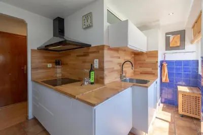 a kitchen with a sink and a counter top at Perfecto apto a orillas del mediterráneo / 4PAX in El Perellonet