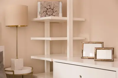 a room with white shelves and a lamp and a mirror at MD Julio Antonio in Valencia