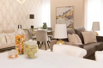 a living room with a couch and a table at MD Julio Antonio in Valencia
