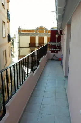 a balcony of a building with a view of a street at Apartamento Portalet 7 in Benaguacil