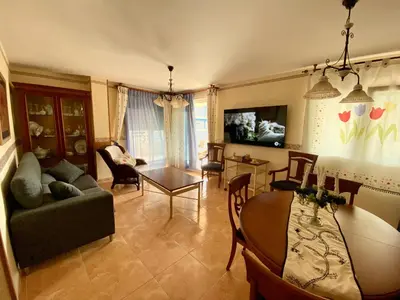 a living room with a couch and a table at Retiro Playa y Spa in Tavernes de Valldigna