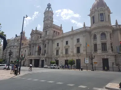 a large building with a clock tower on a street at Bianca in Valencia