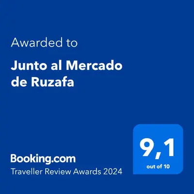 a screenshot of a cell phone with the text wanted to juninia all mecca at Junto al Mercado de Ruzafa in Valencia