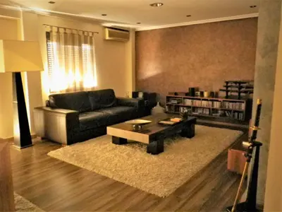 a living room with a couch and a coffee table at AA la Nueva Fe in Valencia