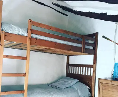 a bedroom with two bunk beds in a room at Casa Rural La Antigua in Chelva