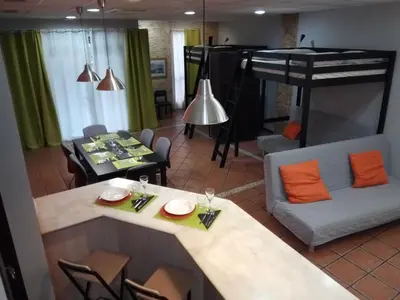a large bed in a room with two white pillows at Espai Loft Valencia in Valencia