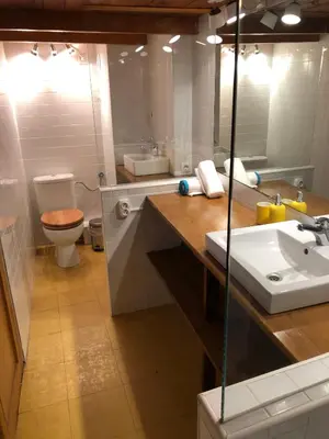 a bathroom with a sink and a toilet at Cozy en Blanch. Center in Valencia