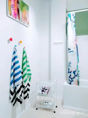a room with two surfboards on a wall at Valencian Dreams Lonja in Valencia