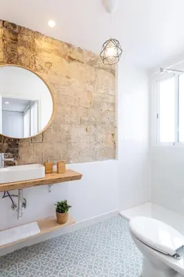 a bathroom with a sink and a mirror at ANELSA Apmts DESCUBRE VALENCIA Y SU PLAYA in Valencia