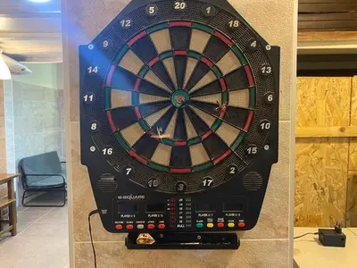 a dart board is on display in a room at better Oh! in Valencia