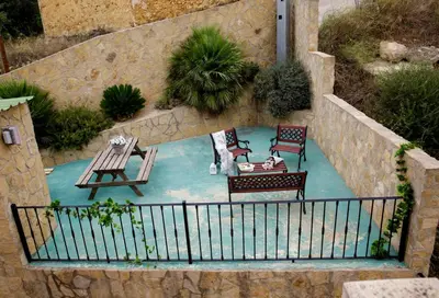 an aerial view of a patio with a table and chairs at Casa Ramos in Navarrés