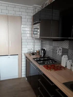 a kitchen with a stove and a counter top at Carrer Roma in Sagunto
