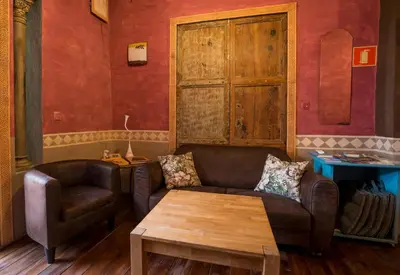 a living room with a couch and a table at DOMUS Amabilis in Sagunto
