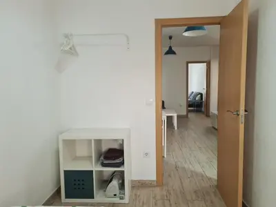 a hallway with a room with a white wall at Campanar flat 2 in Valencia