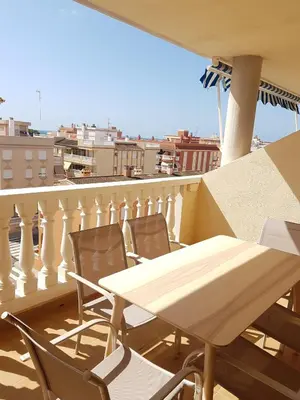 a table and chairs on a balcony with a view at Moncofa Beach in Moncófar