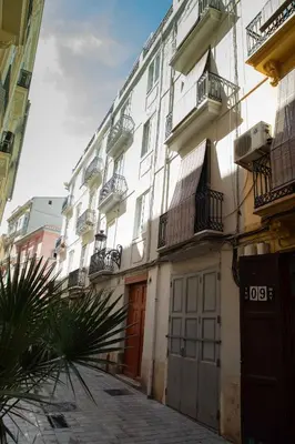a large white building with balconies on a street at FLORIT FLATS - CATHEDRAL LUXURY TERRACE FLAT 2BR 2BA AC Wifi in Valencia