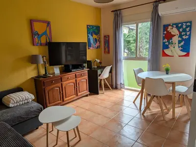 a living room with a couch and a table at Apartamento zona residencial Montesol in La Eliana
