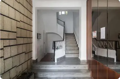 a hallway with stairs in a building at Islas Canarias Apartment in Valencia