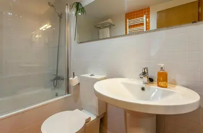 a bathroom with a sink and a toilet and a shower at LUXURIOUS & ALLURING HOME IN HISTORIC TOWN (VALENCIA) in Valencia