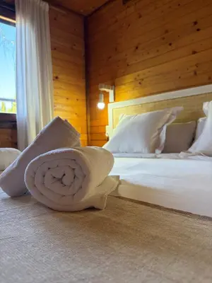 a bedroom with a bed with a towel on the floor at Pago de Tharsys in Requena
