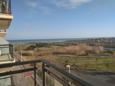 a view of the ocean from the balcony of a house at Apartamento Moncofar playa in Moncófar