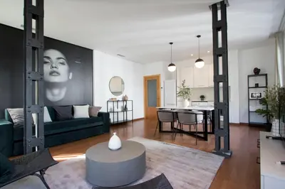 a living room with a couch and a table at Apartamentos San Vicente in Valencia