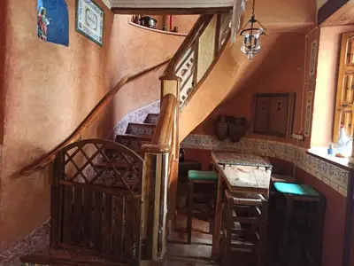 a staircase in a house with a stair case at A la Sombra de la Torre in Serra