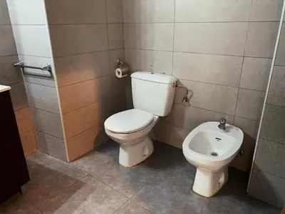 a bathroom with a toilet and a bidet at Ayuntamiento Silence in Valencia