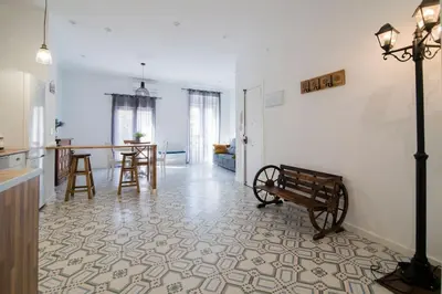a living room with a bench and a table at Cozy Flat in City Center Feel the Vibe SelfCheckIn in Valencia