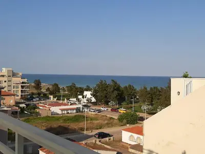 a view of a city with a parking lot at Atico playa Moncofar in Moncófar