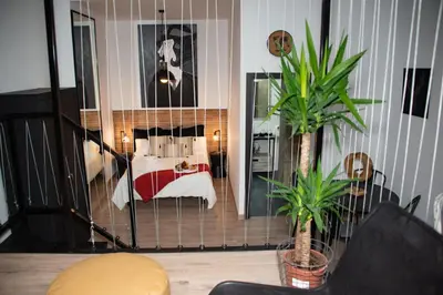 a room with a bedroom with a bed in it at Soraya's Place - Chopín 2 in Valencia