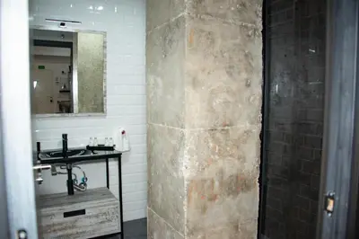 a bathroom with a sink and a mirror at Soraya's Place - Chopín 2 in Valencia