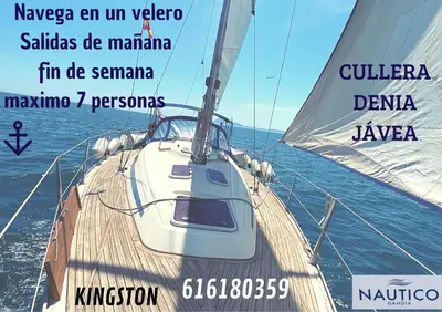 a sailboat on the water with the words navayaan anuvyva at 1era linea de playa VILLA MARGARET Cullera Marenyet in Cullera